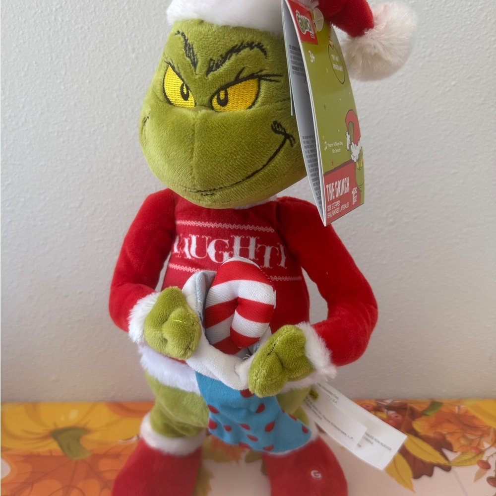 New Santa Grinch Side Stepper Animated Plush.